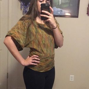 Lose and fitted warm toned top